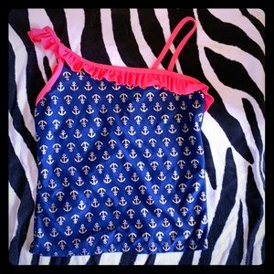 Super cute Tankini top with asymmetrical straps.